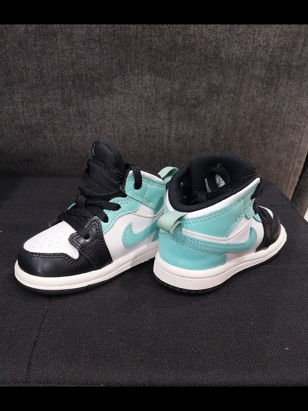Nike Jordan 1  White, Black & Blaeched Teal 4c